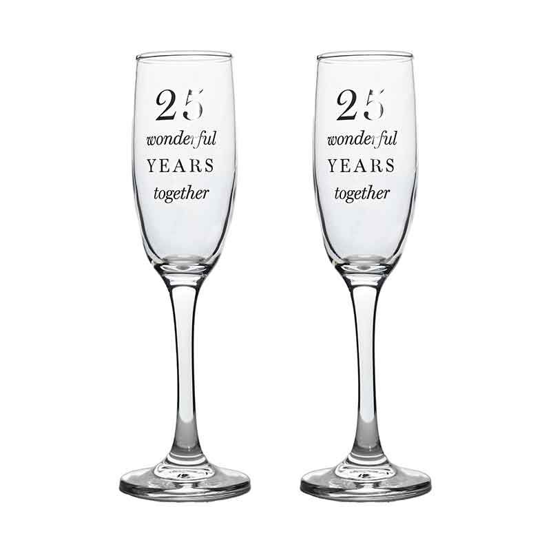 Pair of clear champagne flutes engraved with “25 wonderful years together”, designed to celebrate a 25th wedding anniversary.