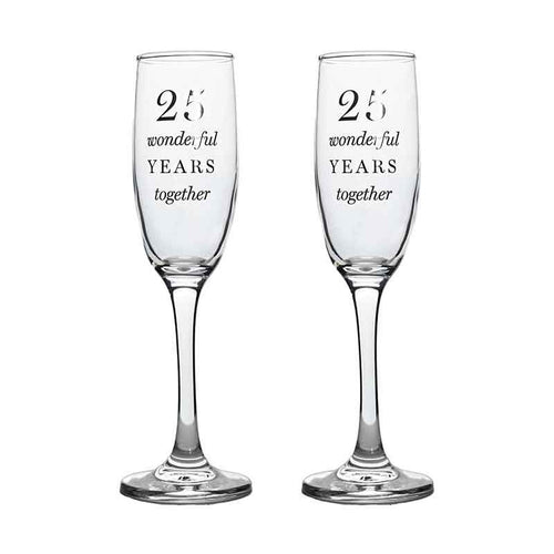 Pair of clear champagne flutes engraved with “25 wonderful years together”, designed to celebrate a 25th wedding anniversary.