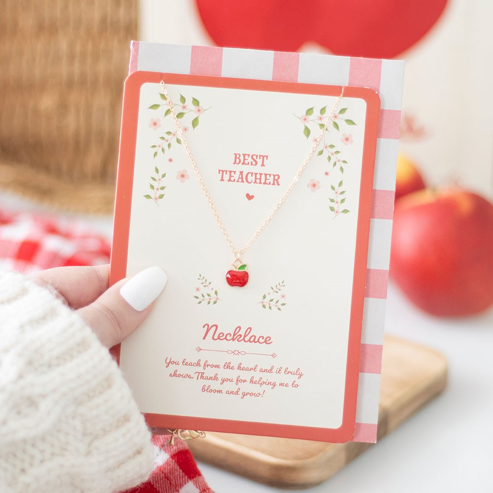 Best Teacher apple pendant necklace presented with matching greetings card in teacher appreciation design.