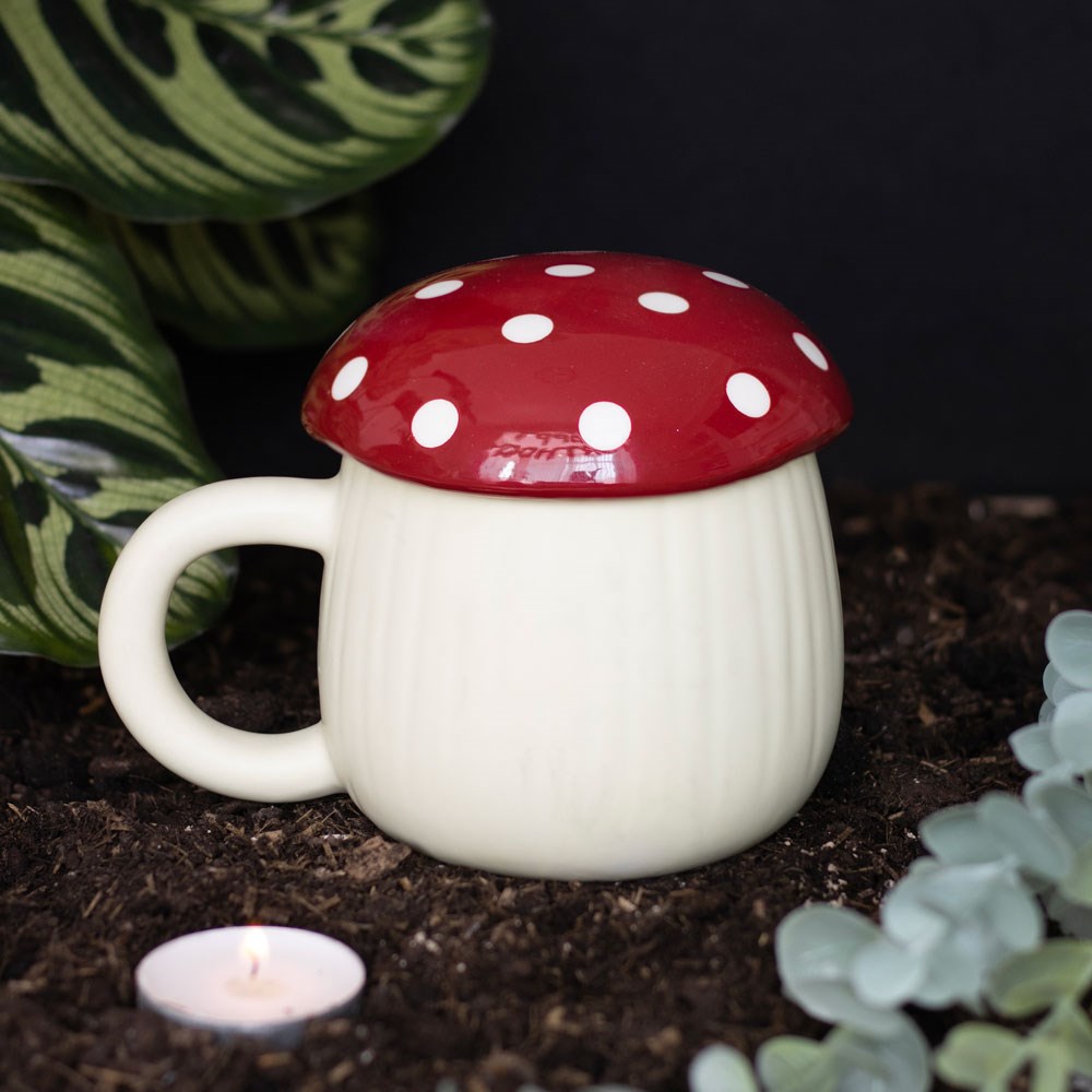 Ceramic mushroom shaped lidded mug, quirky and cosy for hot drinks