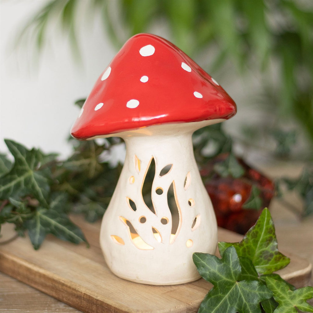 Ceramic mushroom tealight holder, a charming decorative candle accessory