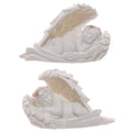 Mini sleeping cherub ornament resting inside angel wings decoration in a peaceful white resin finish.