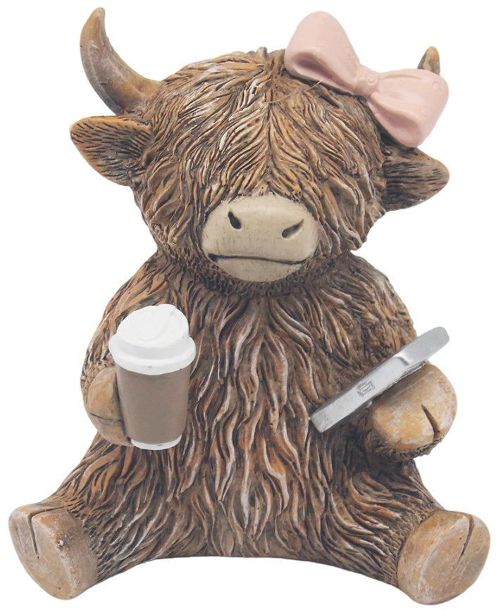 Highland Cow Coffeeholic figurine, novelty resin ornament featuring a coffee-themed cow design for kitchen décor