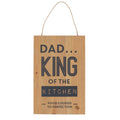 Wooden hanging sign reading “Dad King of the Kitchen” with rustic finish and rope hanger for display.