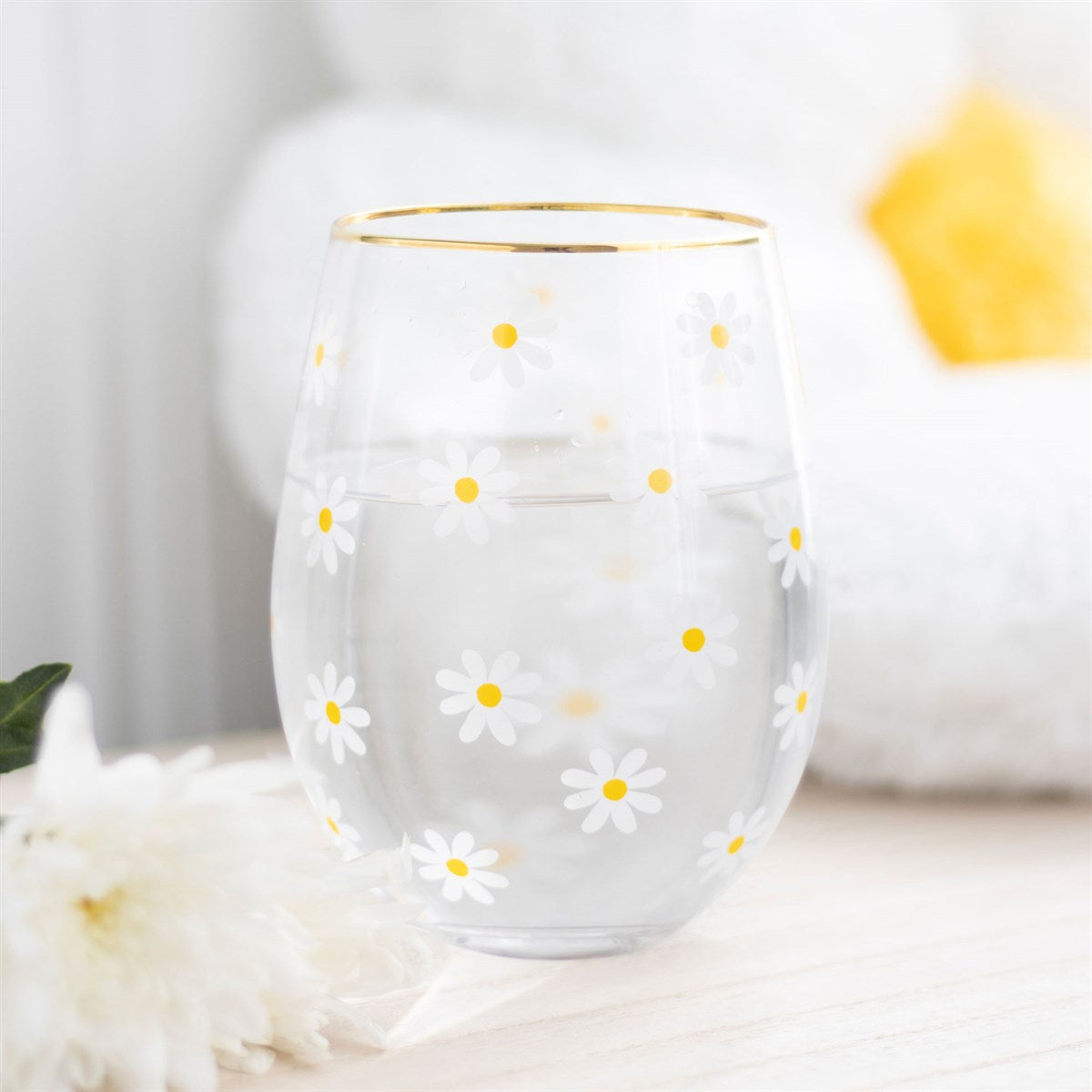Stemless wine glass with daisy print, a fun and elegant choice for drinks and gifting