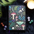 Dark Forest mushroom print A5 lined notebook featuring woodland-inspired fantasy mushroom artwork.