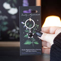 Deadly nightshade metal keyring with black obsidian detail, a dark and unique accessory