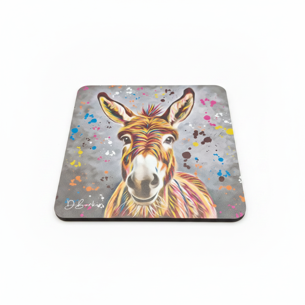 Square rounded-corner coaster featuring a colourful pop art donkey illustration with multicoloured paint splatter design by Deborah Barker, on a dark background