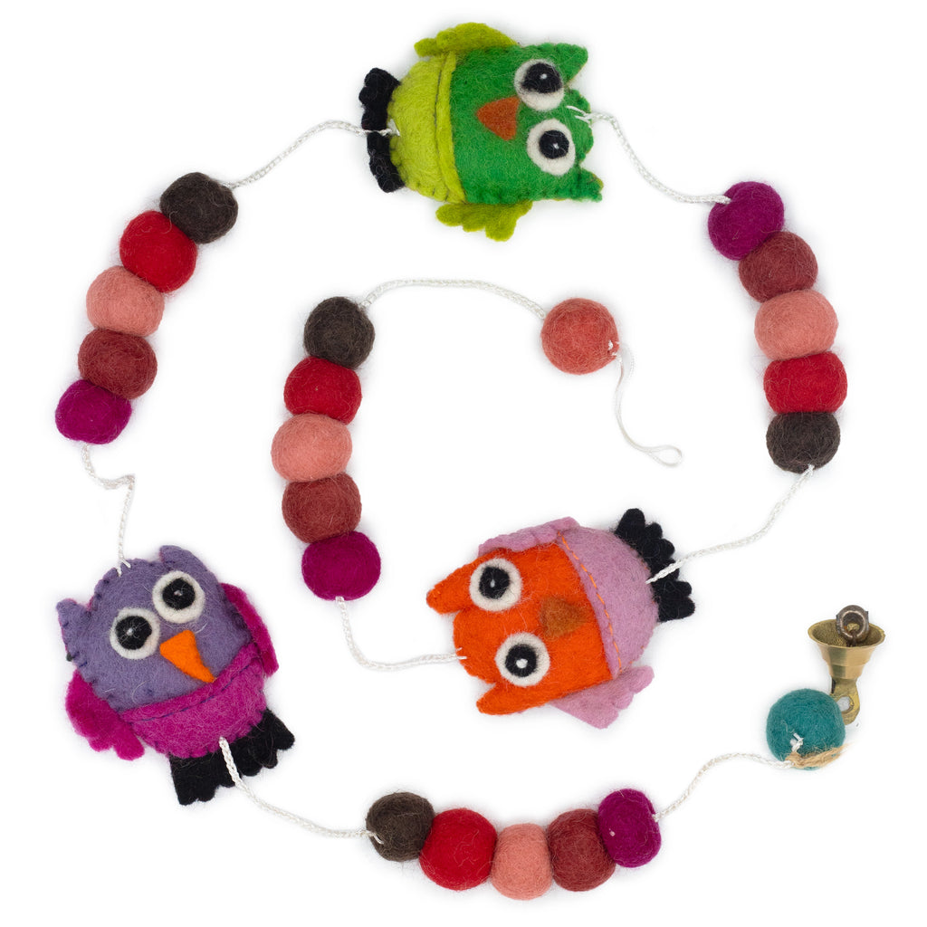 Felt owl wall hanging with soft felt texture and handcrafted style, great for cozy and playful decor