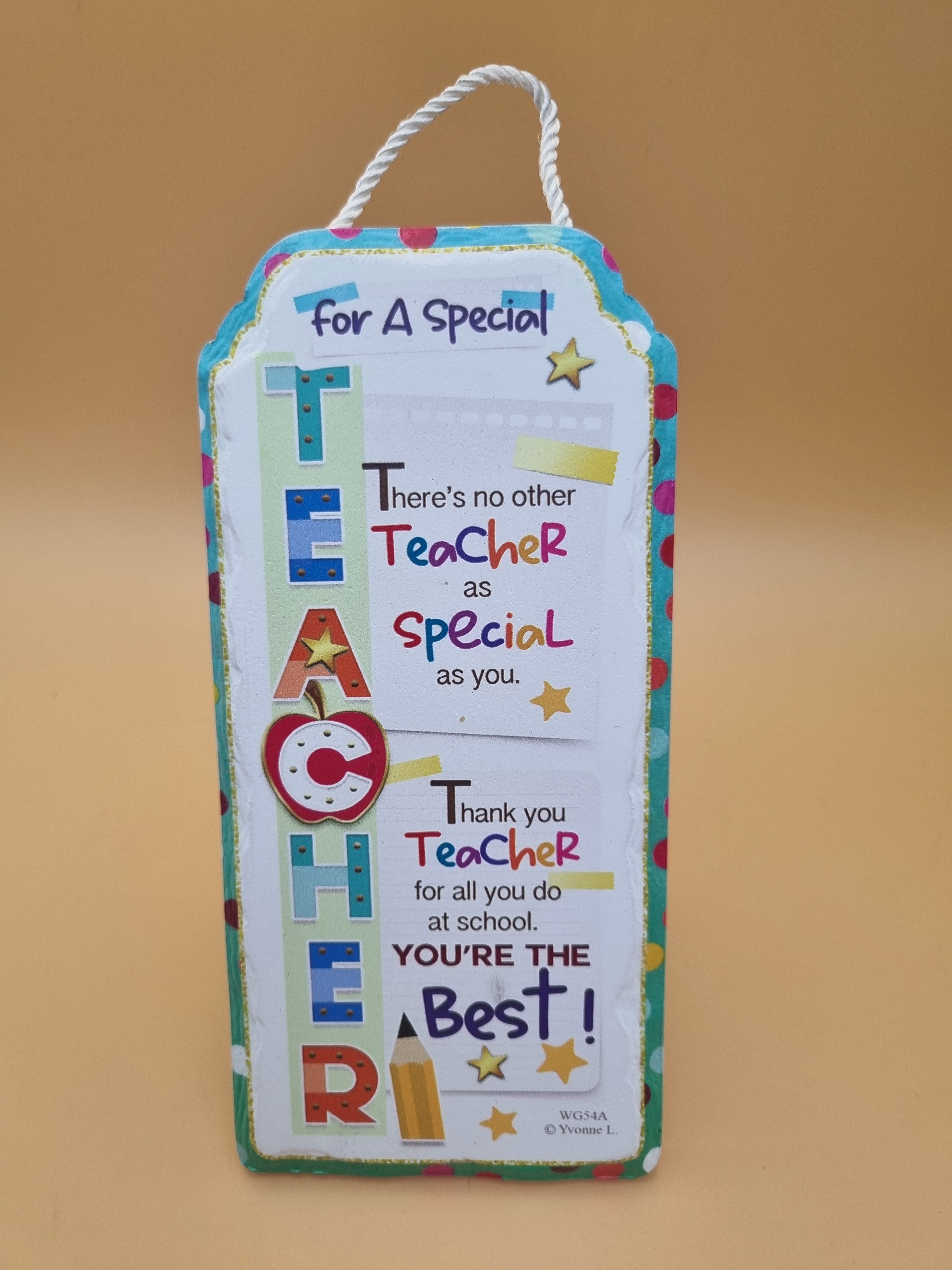Freestanding ceramic plaque featuring “Special Teacher” message with decorative appreciation-themed design.
