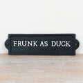 Wall mounted cast iron sign featuring “Frunk As Duck” text with rustic vintage-style humorous design.