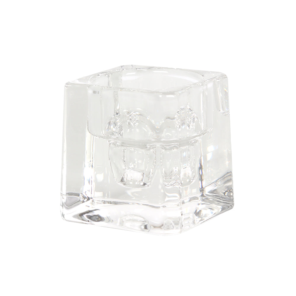 Clear glass cube candle holder suitable for both dinner candles and tealights with contemporary design.