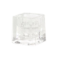 Clear glass cube candle holder suitable for both dinner candles and tealights with contemporary design.