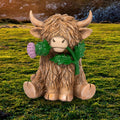 Decorative Highland cow ornament featuring Scottish thistle design with detailed countryside-inspired finish.