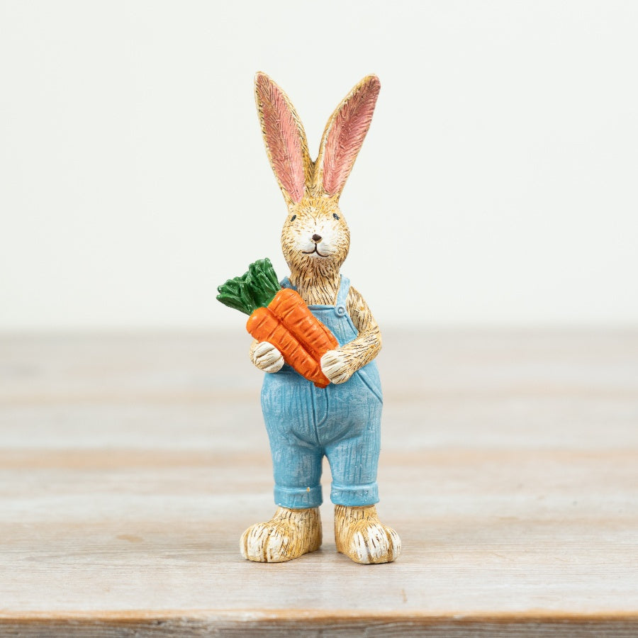 Jasper rabbit ornament holding carrots, a cute and playful decorative piece