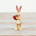 Jasper rabbit holding red heart figurine, a sweet decorative gift for special occasions