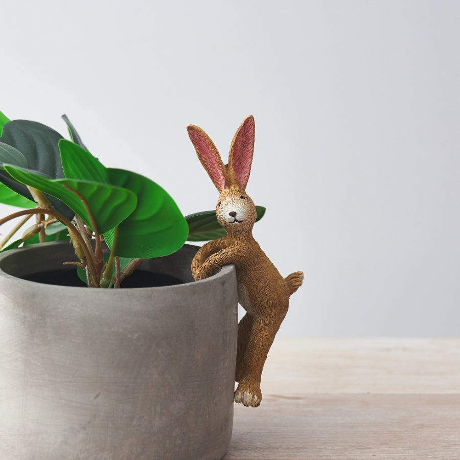 Jasper rabbit pot hanger figurine, designed to sit on plant pots for a whimsical touch