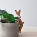 Jasper rabbit pot hanger figurine, designed to sit on plant pots for a whimsical touch