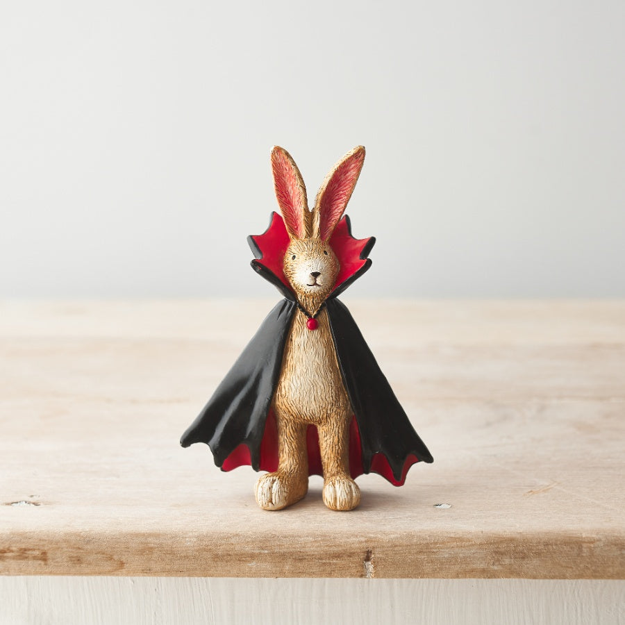 Jasper Rabbit Vampire Ornament wearing a black and red vampire cape, standing Halloween decoration for autumn home décor.