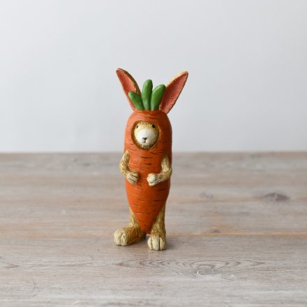 Jasper rabbit figurine wearing a carrot costume, a cute and whimsical decorative ornament for any space