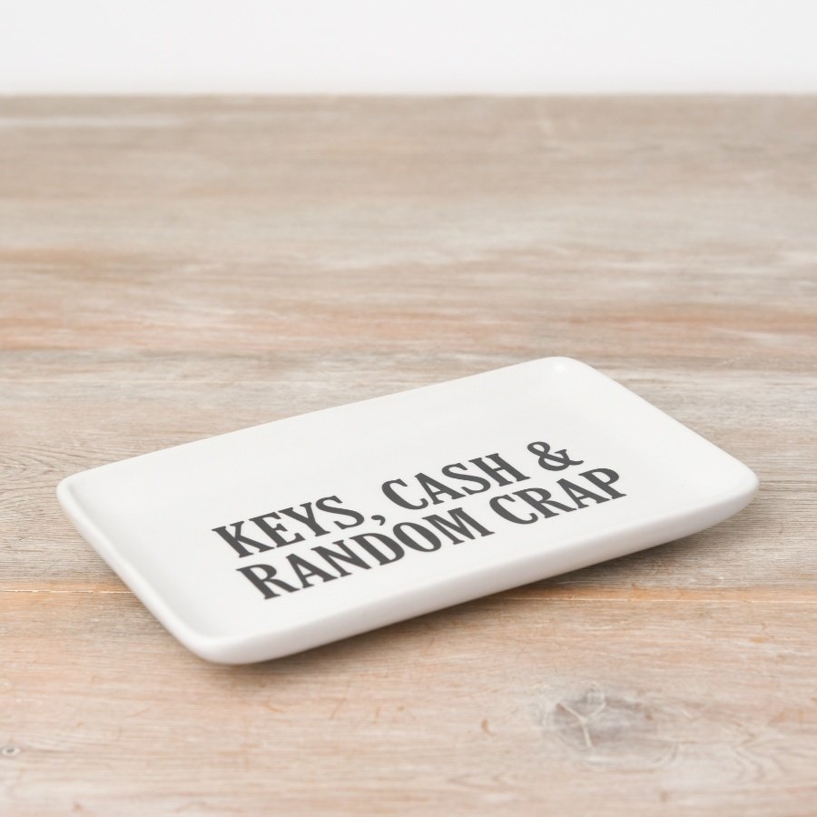 Ceramic trinket tray featuring “Keys Cash & Random Crap” text, designed for holding keys, coins, jewellery, and small everyday items.