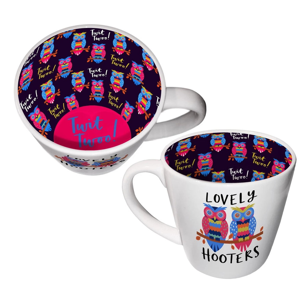 White ceramic inside-out mug showing colourful owl "Lovely Hooters" design on the outside and a vibrant dark purple "Twit Twoo!" owl pattern inside, shown from two angles on a white background