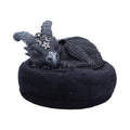 Cult Cuties Lucifly Dreams Figure — black resin sleeping dragon ornament with curved horns, silver skull, pentagram and moon charms, curled on a round black bean bag pillow, 9.1cm