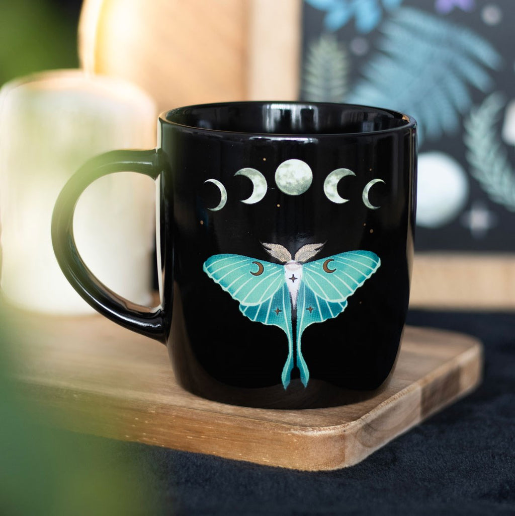 Luna moth ceramic mug with detailed design, perfect for tea or coffee lovers