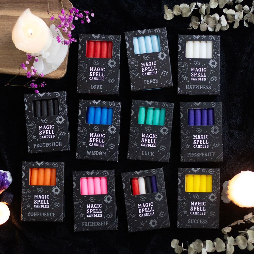 Box of 12 magic spell candles, ideal for rituals, meditation, and intention setting