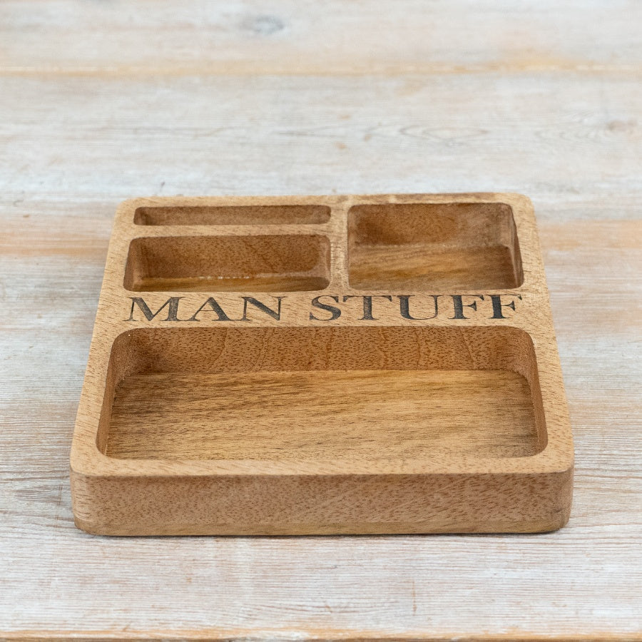 Wooden compartment tray labeled “Man Stuff” with multiple sections for organising small items and accessories.