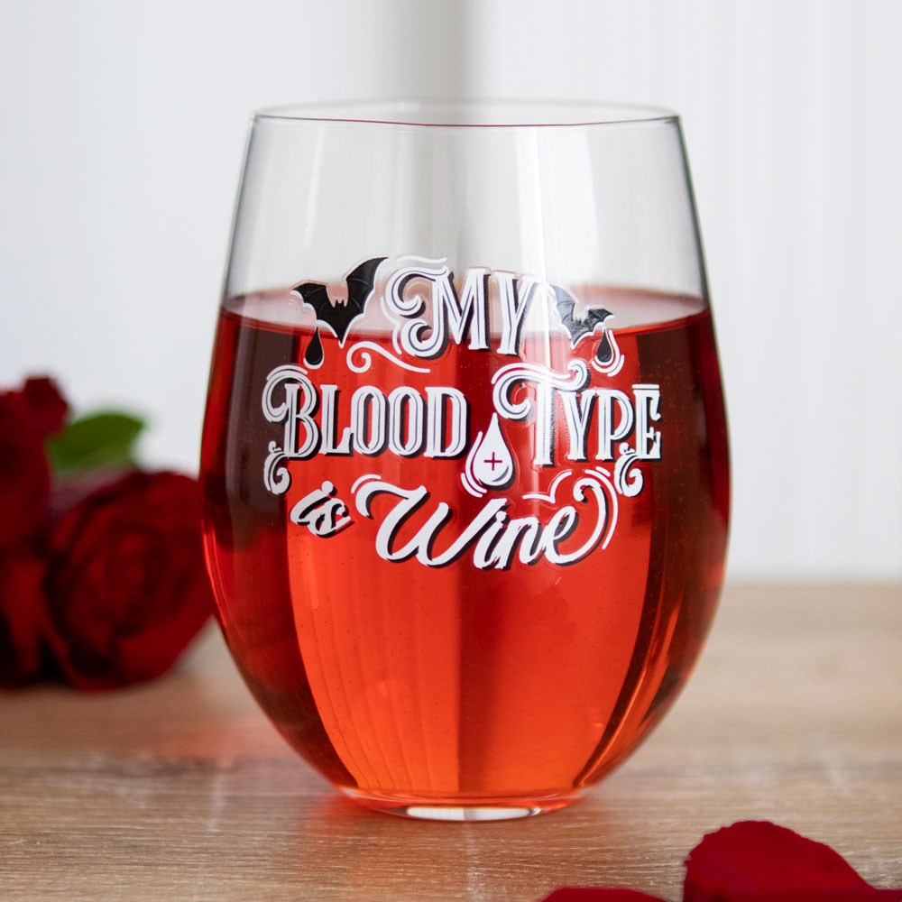 Stemless wine glass printed with 'My Blood Type is Wine' gothic lettering and bat illustrations