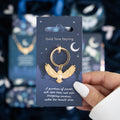 Gold-tone metal keyring featuring a “Night Owl” themed owl charm with decorative detailing and attached keyring loop.