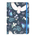 A5 lined notebook with a dark navy cover featuring a white barn owl in flight surrounded by blue morpho butterflies, pastel mushrooms, crescent moons, dandelion clocks, and teal botanical leaves, with a blue elasticated closure.
