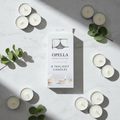 Pack of 8 Opella tealight candles with up to 8 hours burn time each, suitable for oil burners, wax warmers, and candle holders.