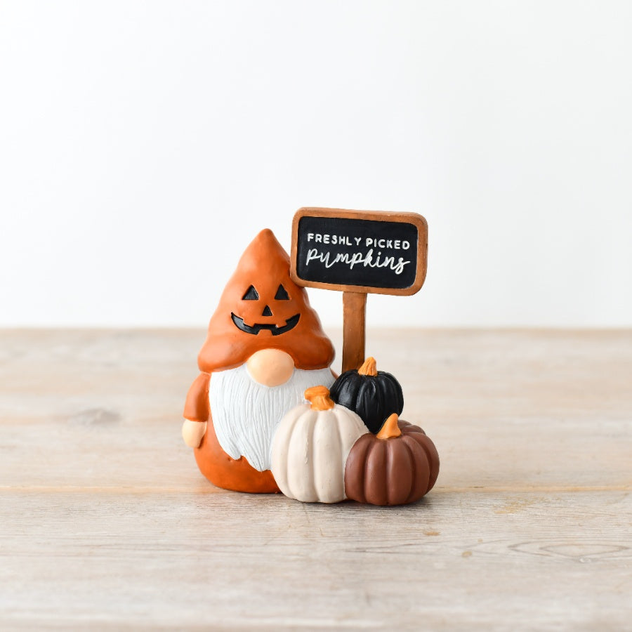 Autumn gonk ornament wearing a pumpkin-shaped hat, standing beside white, black and orange pumpkins with a "Freshly Picked Pumpkins" sign.
