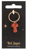 Red jasper crystal mushroom shaped keyring featuring natural gemstone detail and attached metal keyring.