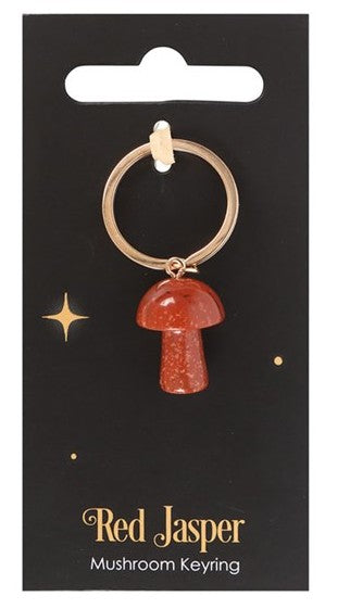 Red jasper crystal mushroom shaped keyring featuring natural gemstone detail and attached metal keyring.