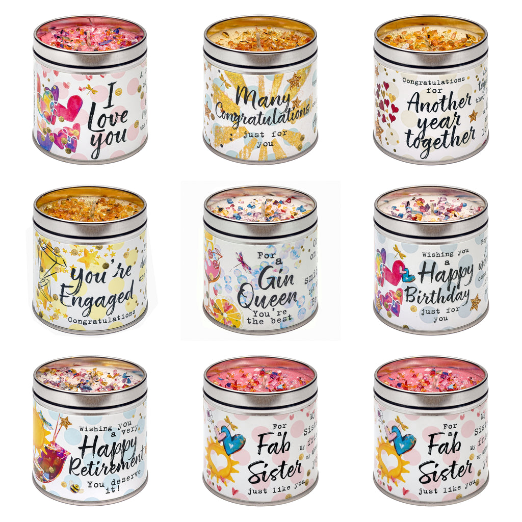 Scented glitter candle tins with various slogans, perfect for gifts and celebrations