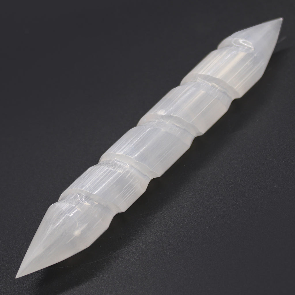 16cm selenite spiral wand featuring double pointed ends and a carved twisted crystal design.