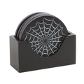 Set of four black round wooden coasters with white spiderweb design, stacked in a matching black wooden holder on a white background
