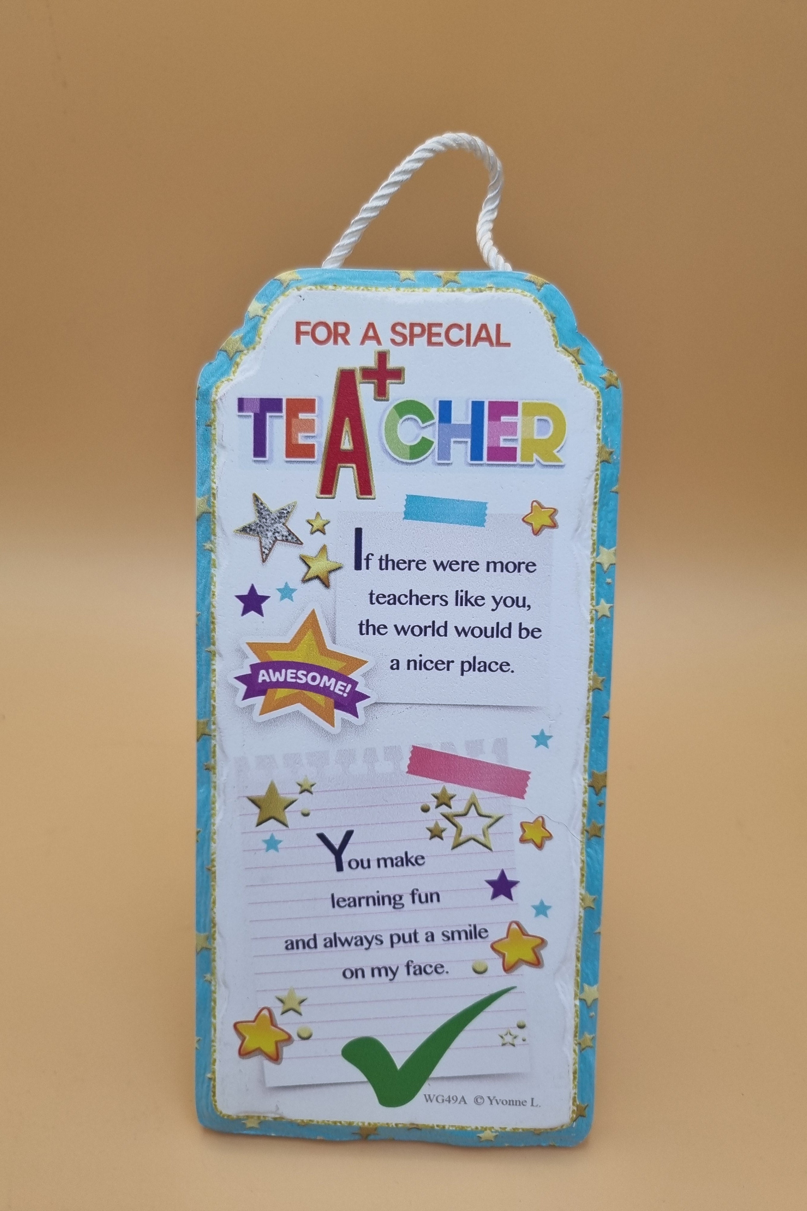 Freestanding ceramic plaque featuring “For A Special Teacher” message with decorative appreciation design.