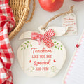 Shaped wooden sign featuring “Teachers Like You Are Special” message with decorative appreciation design.