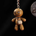 Dark Curse voodoo doll keychain measuring 6cm with gothic-inspired design and attached keyring.