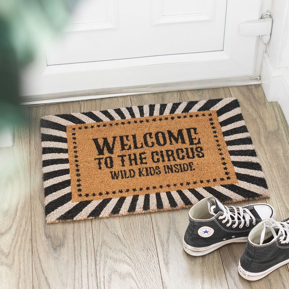 “Welcome to the circus wild kids inside” doormat, a fun and playful home entrance piece