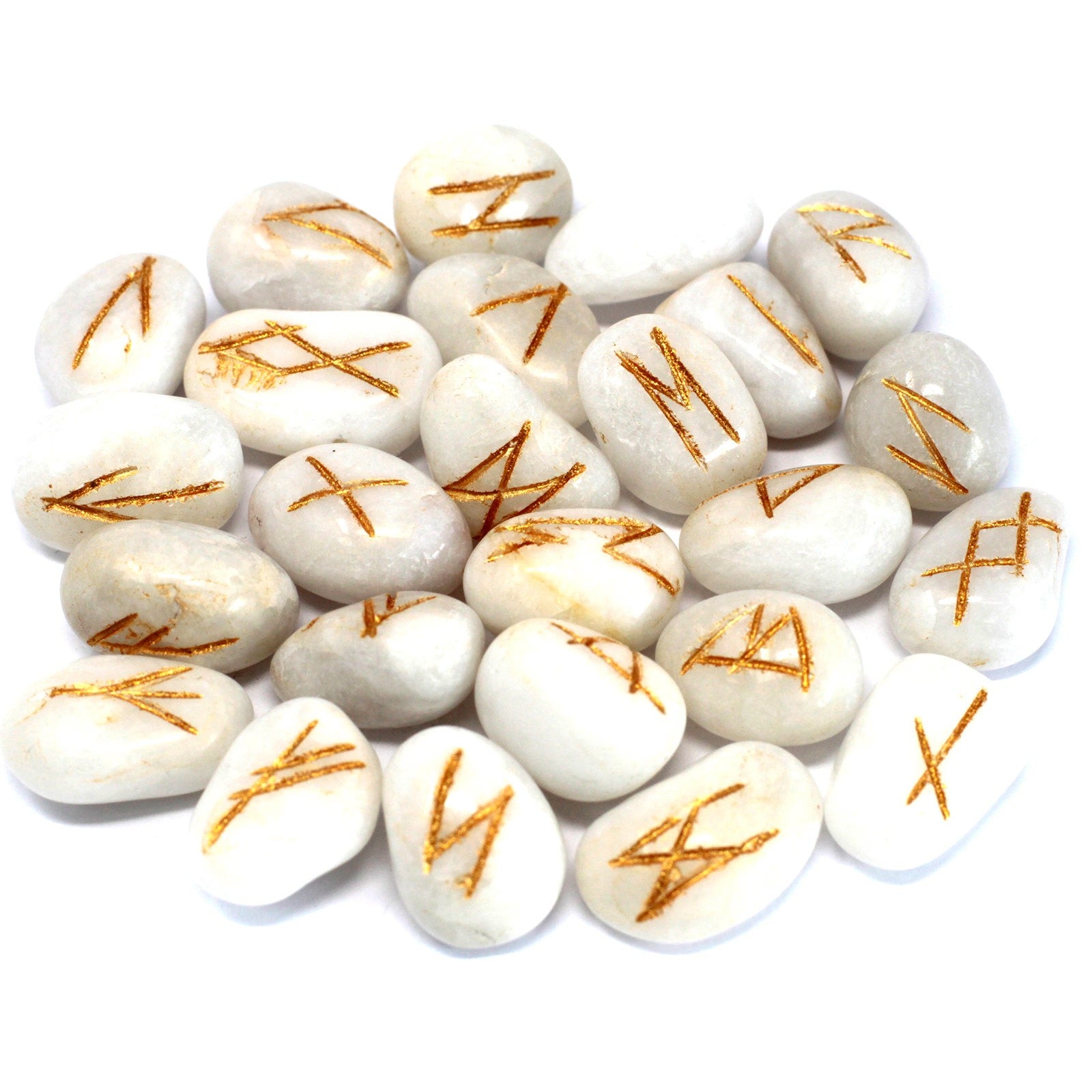 White agate rune stone set featuring engraved symbols on polished white gemstone pieces used for divination and spiritual practices.